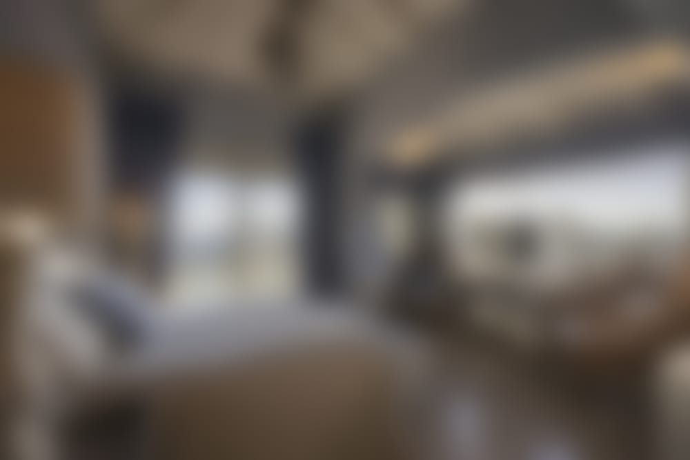 The first bedroom, a spacious, elegantly presented double with sea views and terrace access. (Bedroom 1)